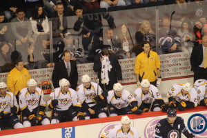 Coach Laviolette takes puck to face