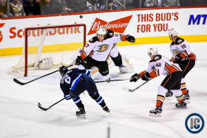 Alexander Burmistrov shoots on net