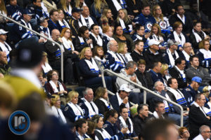 Crowd at MTS Centre wearing scarf