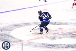 Josh Morrissey heads up ice