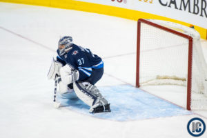Connor Hellebuyck waiting for shot